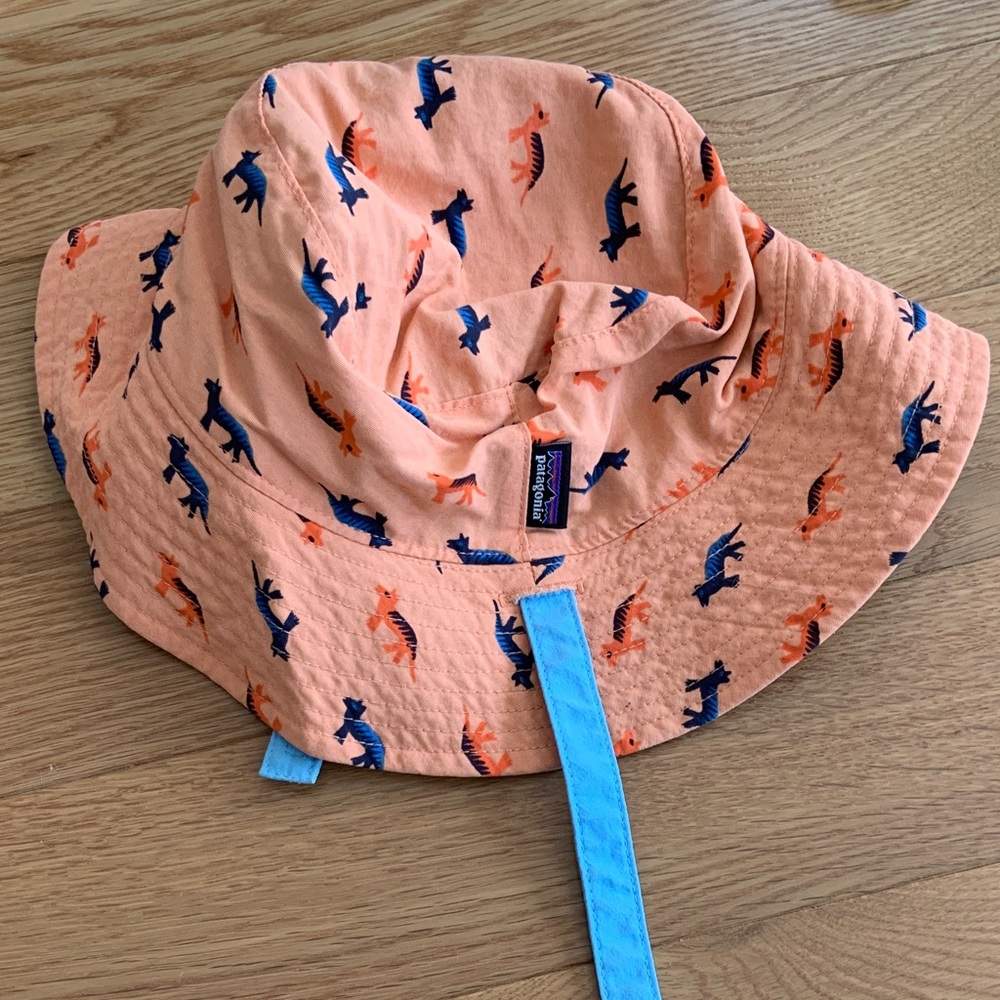 Patagonia Kids Dinosaur Print bucket sun Hat - Peach and Blue reversible